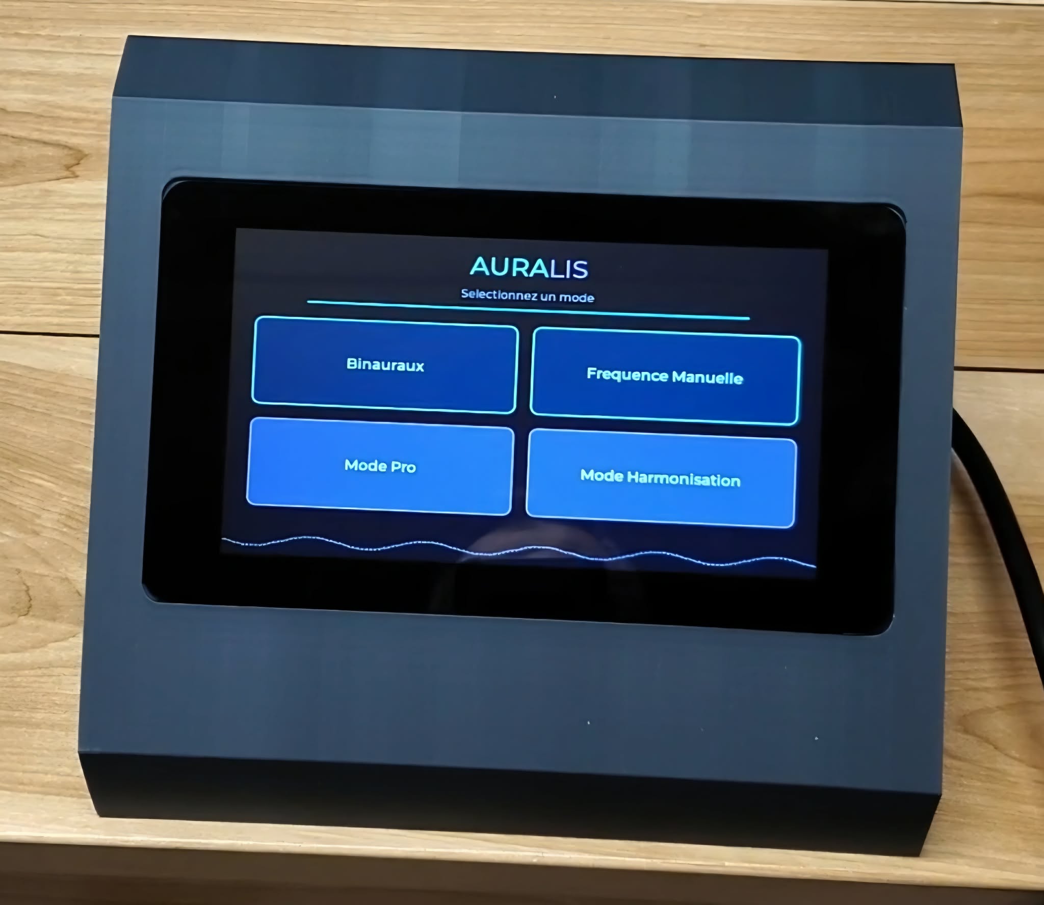 Gros plan de l'écran tactile Auralis affichant le menu des modes